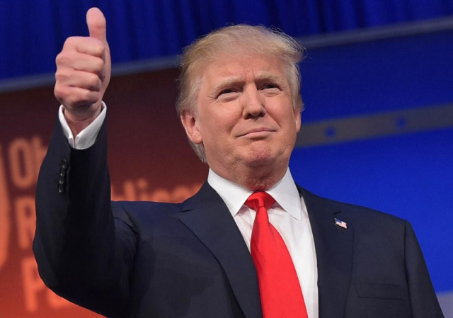 483208412-real-estate-tycoon-donald-trump-flashes-the-thumbs-up-jpg-crop_-promo-xlarge2